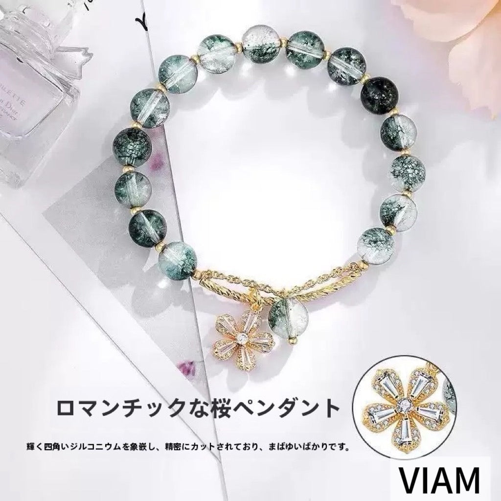 桜グリーンファントム天然水晶ブレスレット|桜のきらめきと深い緑の調和が、手元にやさしい彩りを添える一本